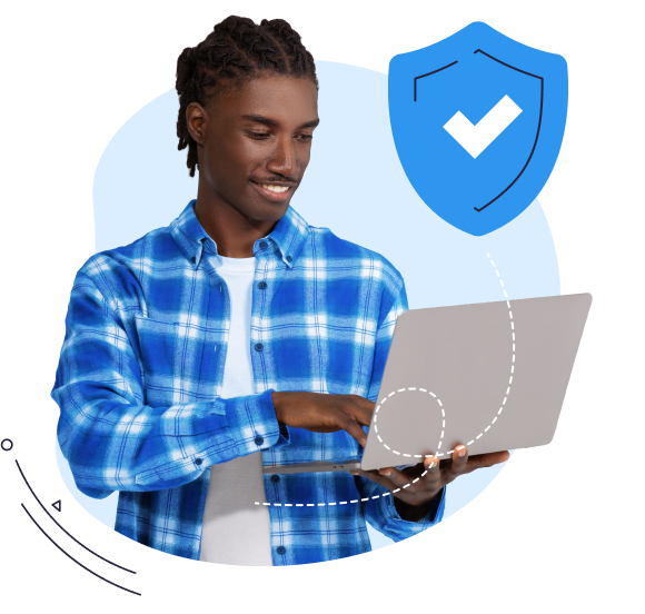 Smiling man in blue plaid shirt using laptop with blue shield and white checkmark icon above.